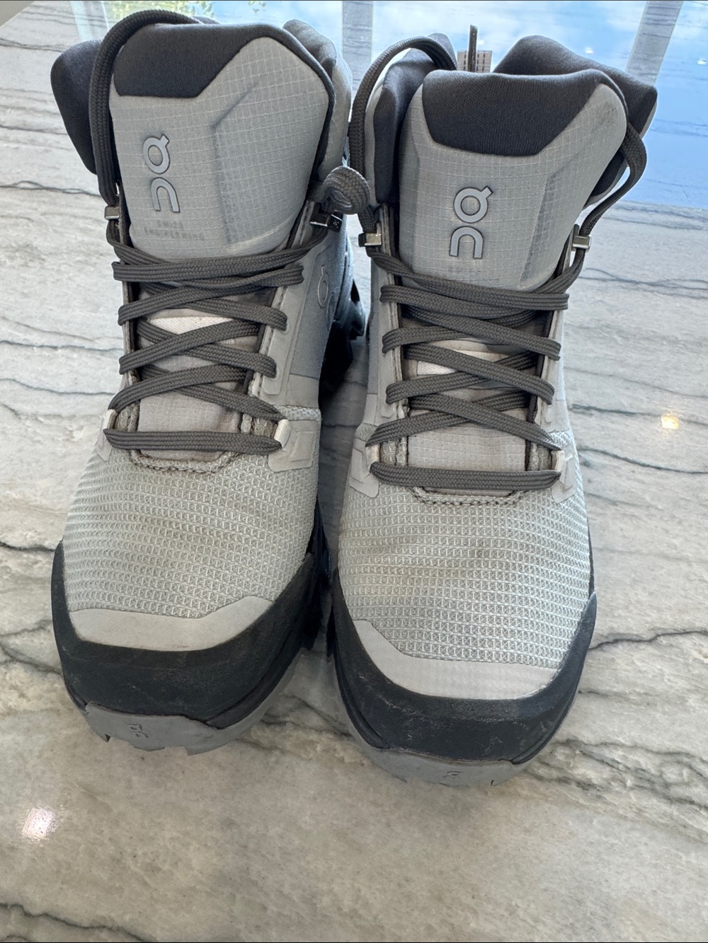 On Running Women's Lace-Up Mid-Top Trail Boots in Light Gray and Black